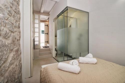 Un pat sau paturi într-o cameră la Studio Coccolina