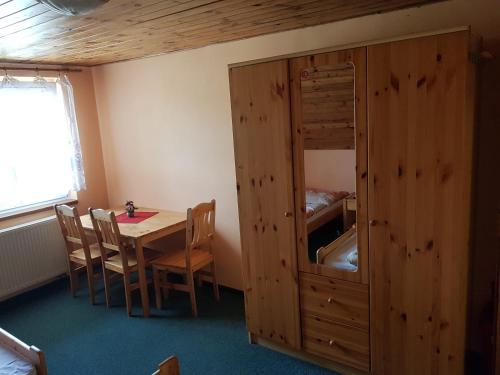 Postel nebo postele na pokoji v ubytování Pension Pod Hrádečkem