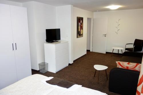 TV a/nebo společenská místnost v ubytování B&B À la montagne