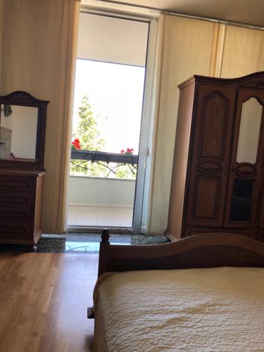 Una cama o camas en una habitación de Villa Kobuleti