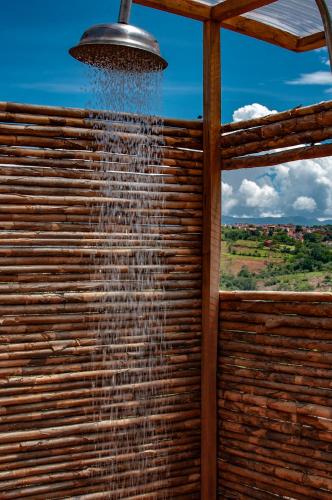 a shower with water coming out of it at Serrania del Viento in Barichara