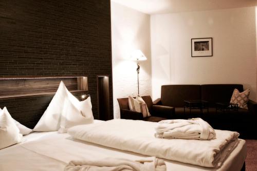 Katil atau katil-katil dalam bilik di Hotel Goldener Berg