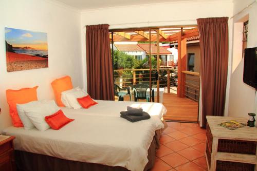 Katil atau katil-katil dalam bilik di Beach House