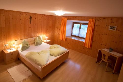 Säng eller sängar i ett rum på Wegscheiderhof