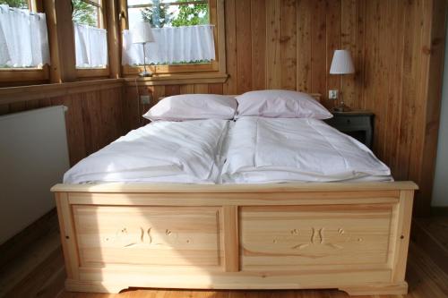 Postel nebo postele na pokoji v ubytování Willa Ubocz