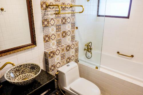 Kúpeľňa v ubytovaní Siri Heritage Bangkok Hotel