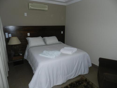 Paradise Inn Hotelにあるベッド