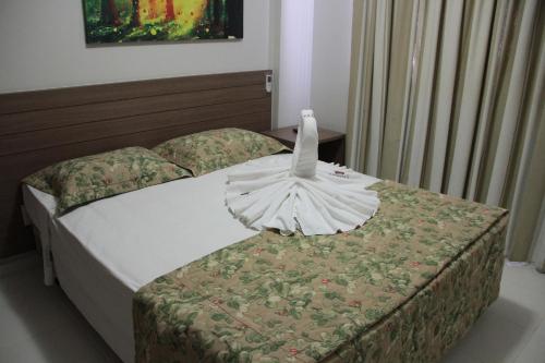 Postel nebo postele na pokoji v ubytování Veredas do Rio Quente Flat
