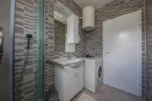 Kuchyňa alebo kuchynka v ubytovaní Apartman Adriatic