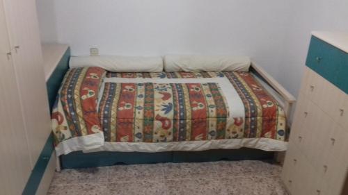 Кровать или кровати в номере Apartamento El Misteri