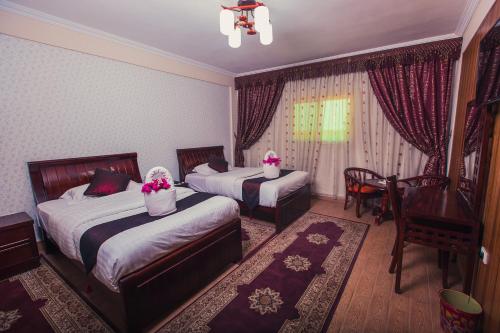 
A bed or beds in a room at La Viena Health Resort

