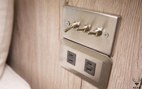 a metal door handle on a wooden door at NEAR B&b 2283 in Hualien City
