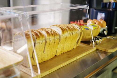a sandwich sitting on top of a counter at The Cube Hotel in Seoul