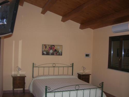 Posteľ alebo postele v izbe v ubytovaní Borgo Rigolizia Vacanze