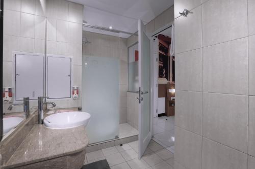 Ванная комната в favehotel Braga
