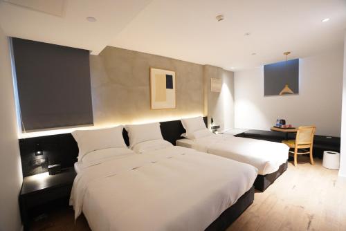 Cama o camas de una habitación en Xu Li Traveling Hotel Chengdu T aikoo Li Chunxi Road Branch