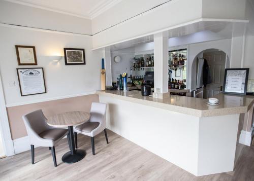
The lounge or bar area at Corner House Hotel Gatwick
