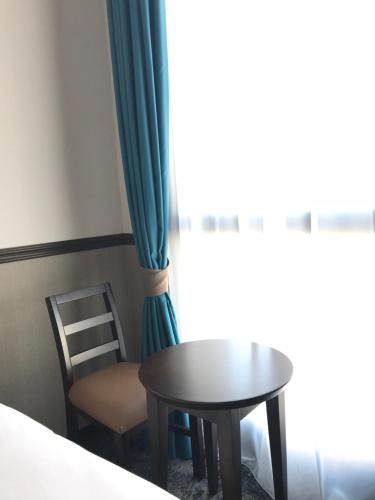 Un ou plusieurs lits dans un hébergement de l'établissement Toyoko INN Marseille Saint Charles