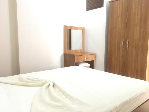 Katil atau katil-katil dalam bilik di Seaside Apart Hotel