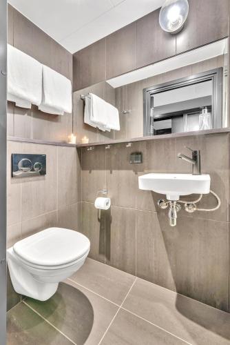 Ένα μπάνιο στο Forenom Aparthotel Oslo