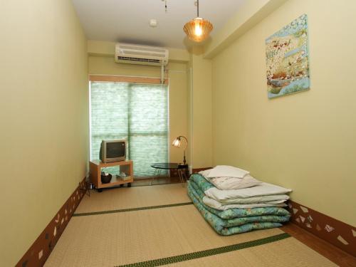 Postel nebo postele na pokoji v ubytování Hostel Zen