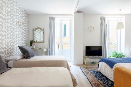 Ένα ή περισσότερα κρεβάτια σε δωμάτιο στο Apartamento Smile Sol