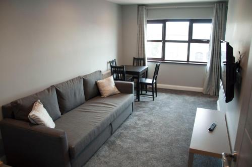 
A seating area at The Square Guest Apartment
