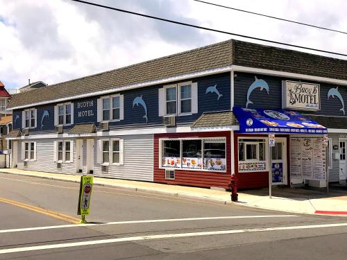 a blue and white building on the corner of a street at Buoy 16 Motel by the Beach in Seaside Heights