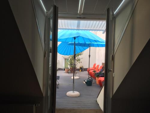 En terrasse eller udendørsområde på Central Hotel bel étage