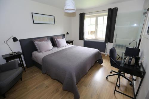 Postel nebo postele na pokoji v ubytování B&B Le Bois de Champia
