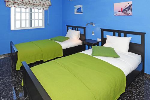 Postel nebo postele na pokoji v ubytování Villa La Hoya