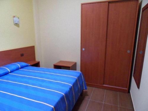 Katil atau katil-katil dalam bilik di Residence Bandiera Gialla