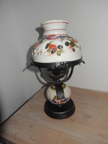 a vase sitting on top of a wooden table at 4 Rooms Piata Sfatului in Braşov