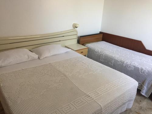 Postel nebo postele na pokoji v ubytování Marotta Charminghouse