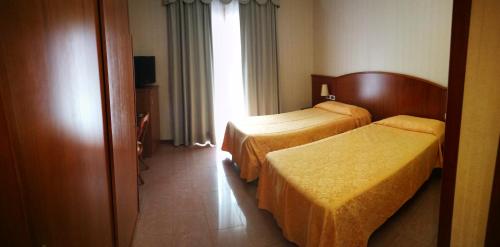 Hotel Willyにあるベッド