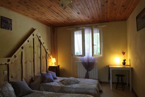 Postel nebo postele na pokoji v ubytování calsimunot