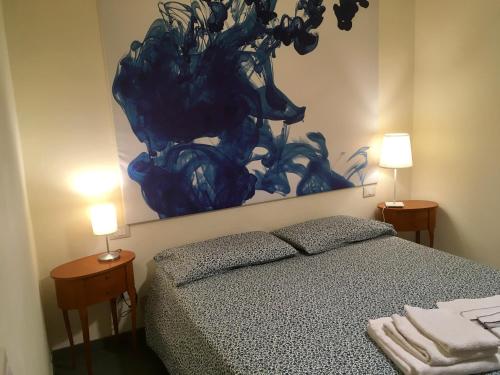 Postel nebo postele na pokoji v ubytování La Casina di Eleonora