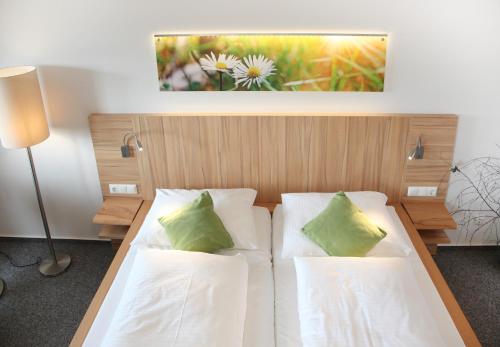 מיטה או מיטות בחדר ב-Gasthof Altes Casino