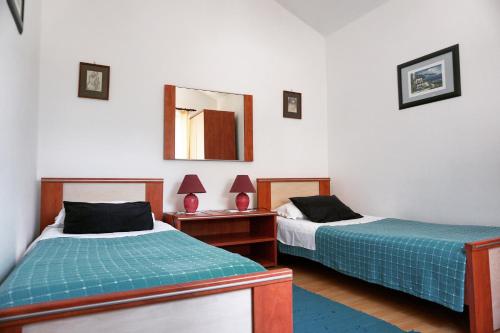 Posteľ alebo postele v izbe v ubytovaní P&D Apartments