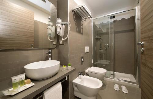 Koupelna v ubytování Hotel H21