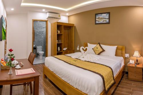 Cama o camas de una habitación en Hoi An Vi Khoa Villa