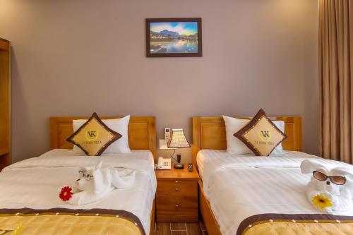 Cama o camas de una habitación en Hoi An Vi Khoa Villa