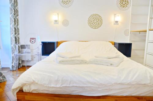 Postel nebo postele na pokoji v ubytování Quatre Chaises