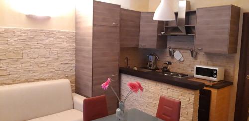 a kitchen with a sink and a counter top at Appartamento Antonacci in Monopoli