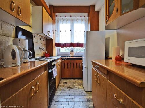 Kuchyň nebo kuchyňský kout v ubytování Dom Turysty SALUS