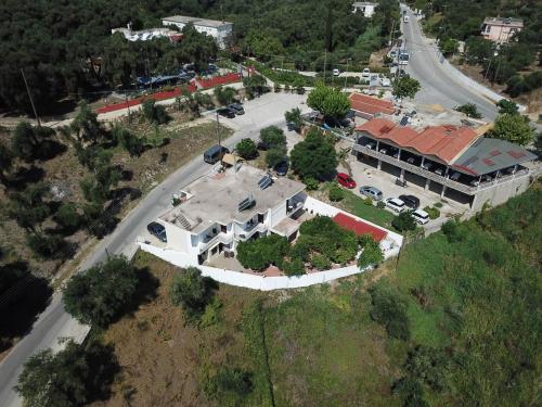 an overhead view of a large house with a road at Tsanis in Parga