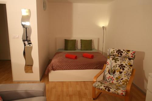 Postel nebo postele na pokoji v ubytování Golden Family Apartments
