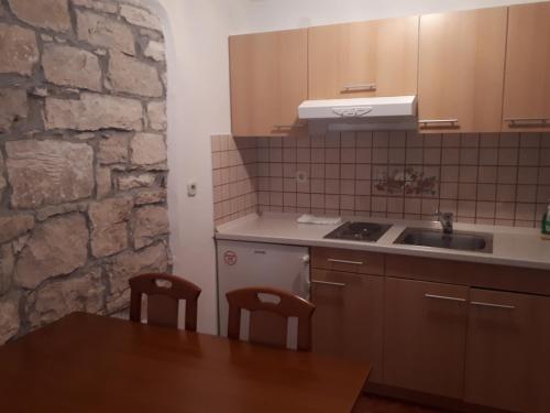 Η κουζίνα ή μικρή κουζίνα στο Apartments Lav Poreč