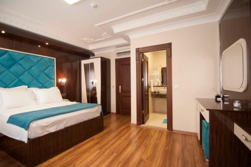Katil atau katil-katil dalam bilik di Akbiyik Suite Boutique Hotel