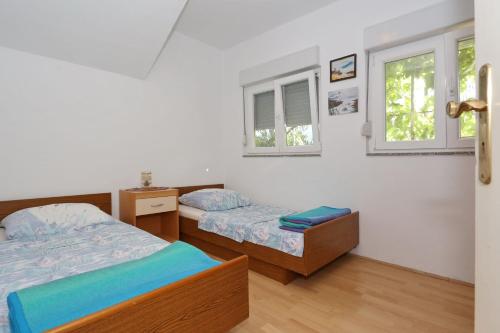 Postel nebo postele na pokoji v ubytování Villa Neyla
